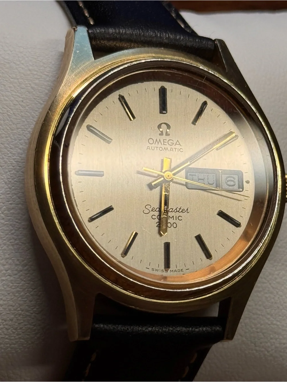 Omega Gold Dial Automatic Watch with Black Leather Strap